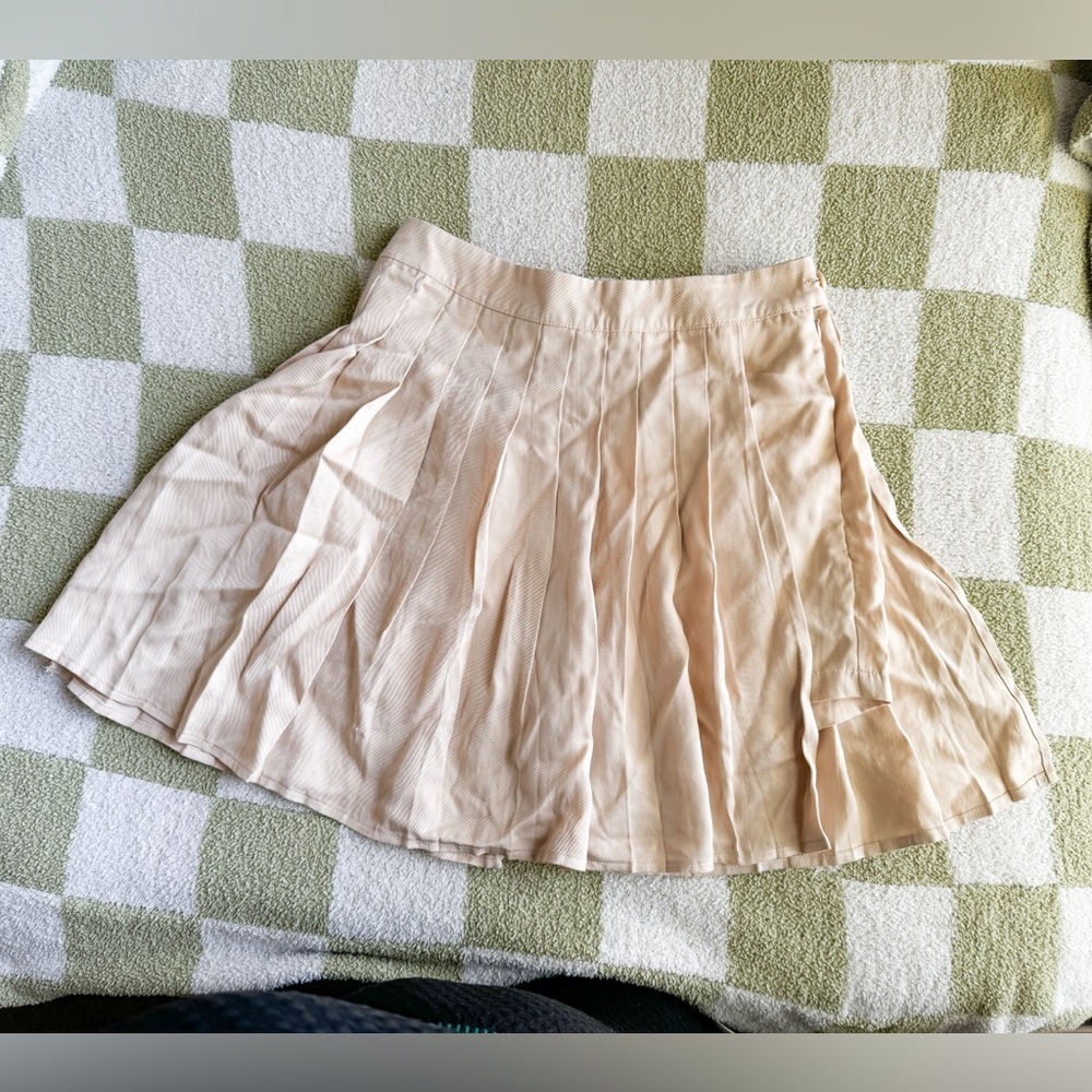 Beige asymmetrical tennis skirt with shorts